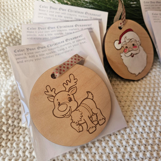 Wooden color-your-own Christmas ornament featuring Santa, Grinch, elf, and reindeer options.